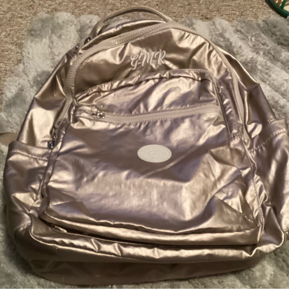 Kipling Shiny Gold Backpack. It has been monogrammed.